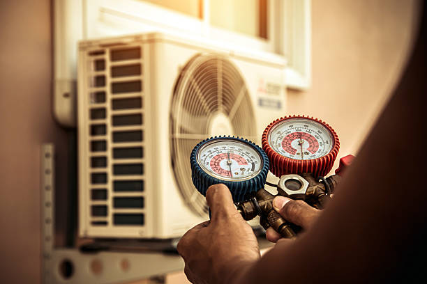 Professional Hvac technician working in Amesbury, MA